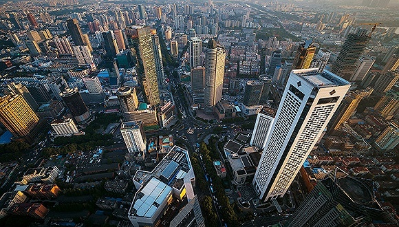 59家A股房企预告全年业绩增长超七成|界面新闻