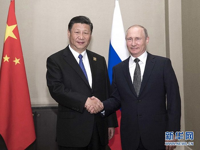 6月8日，国家主席习近平在阿斯塔纳会见俄罗斯总统普京。 新华社记者兰红光 摄