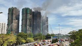 香港火灾背后:争议高楼竹制脚手架